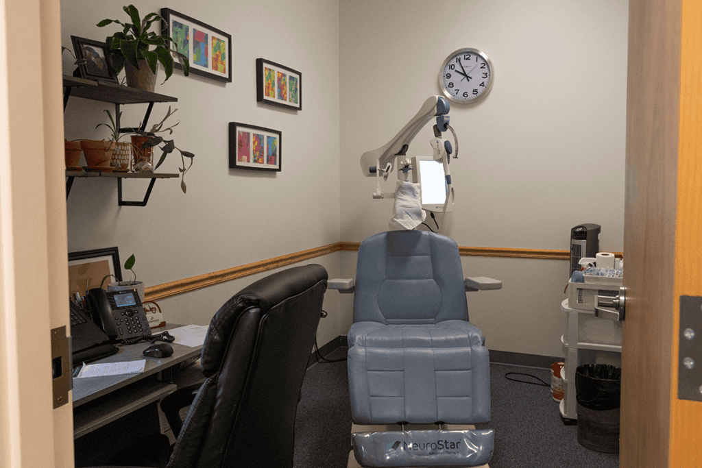 transcranial magnetic stimulation therapy chair in the offices at the wheeling wv harmony location