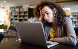 A woman reading about ADHD and neurodiversity